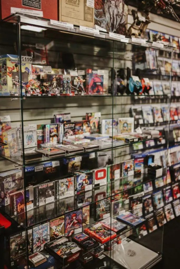 Lots of rare video games, controllers, Amiibos, and collectibles in our glass case at Game World - West Bloomington