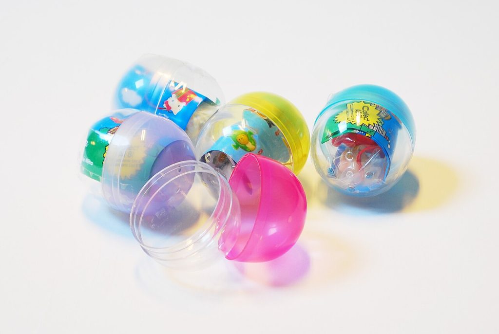 Various toys in colorful Gashapon capsules